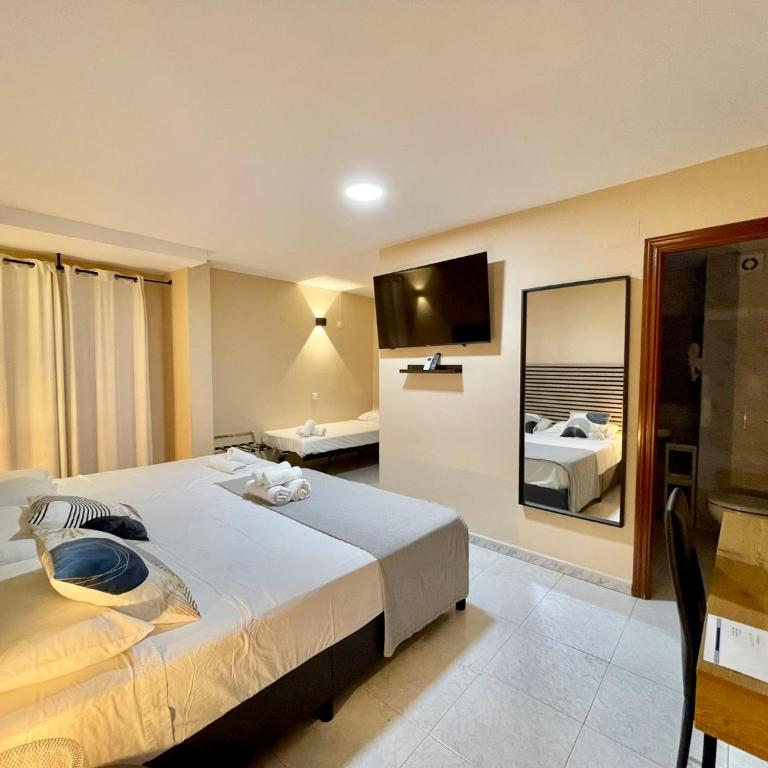 Júbilus Rooms - Habitación Cuádruple Económica - 2