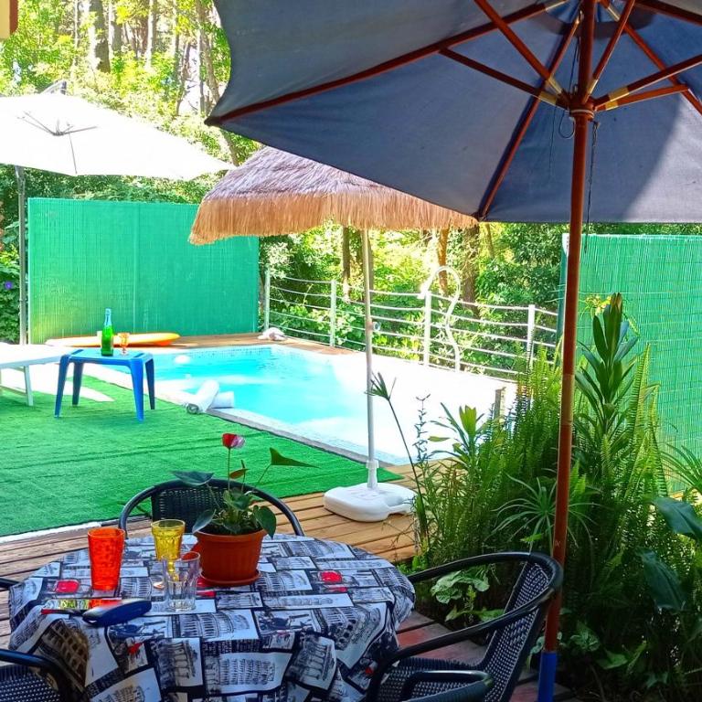 Piscina-Jacuzzi Parrilla Playa Casa 3 Dormitorios - Three-Bedroom House - 20