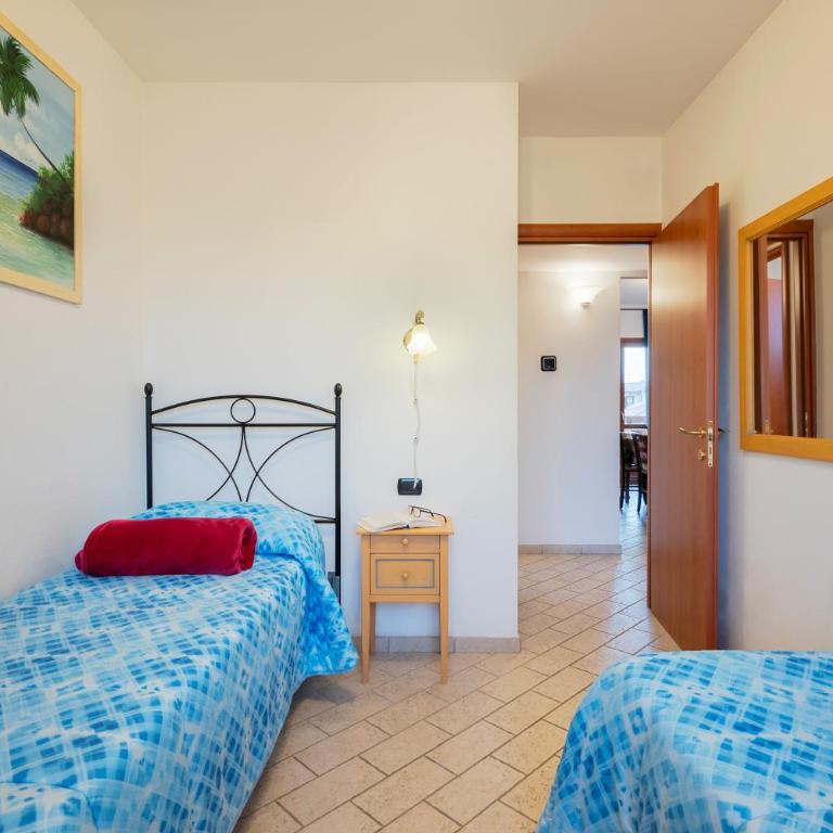 Follonica Apartments - Pool & Relax - Three-Bedroom Apartment - Split Level (6 Adults) - 13
