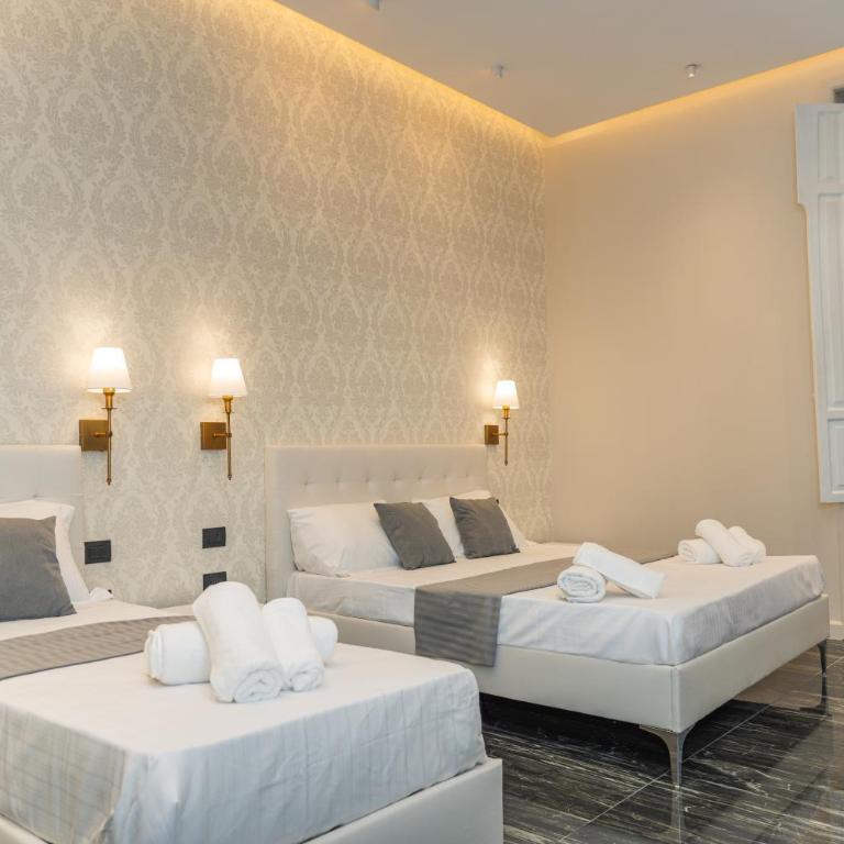 Relais Mermaid Luxury Suite - Camera Tripla Deluxe con Vista Mare - 1