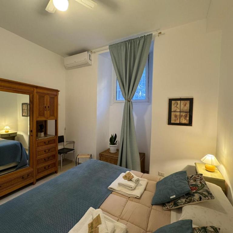 Warm Hideaway in Vibrant Tuscolano - Two-Bedroom Apartment - 18