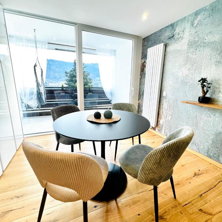 See-Apartment AURA am Fuße der Gerlitzen Alpe und Ufer des Ossiacher Sees - mit privatem Seezugang & Hallenbad - Apartment - 1