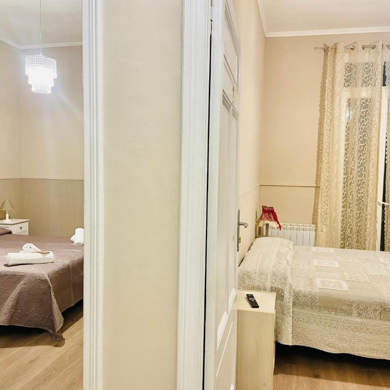 Nonna's Affittacamere - Camera Matrimoniale/Doppia con Letti Singoli con Bagno in Comune - 2