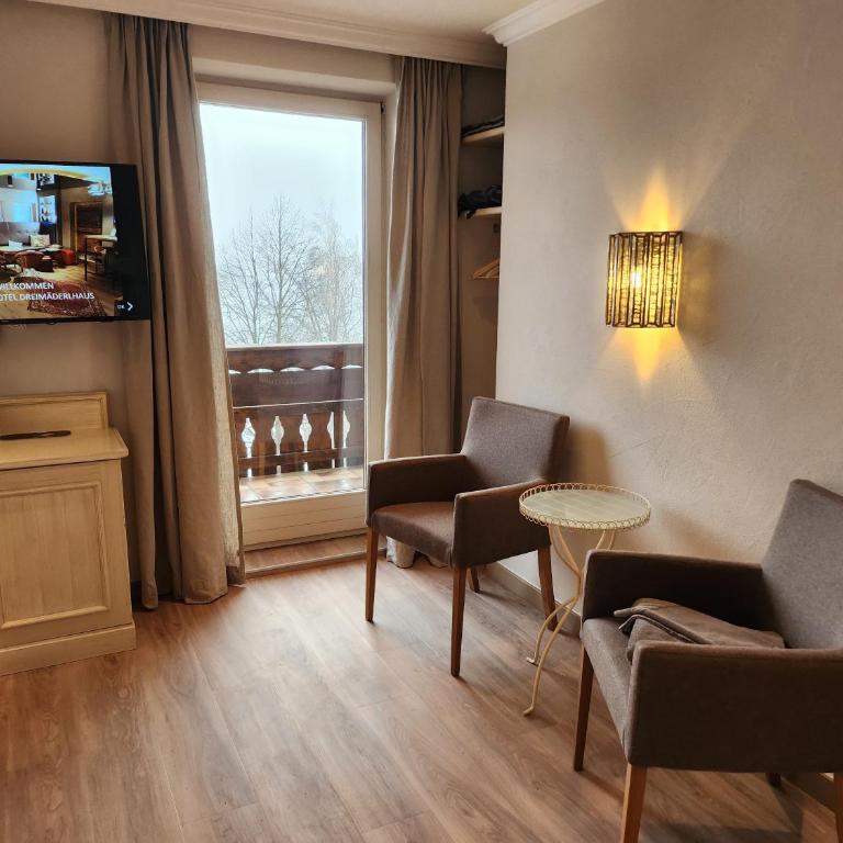 Dreimäderlhaus - Das vegetarische Boutique Hotel - Romantikzimmer mit Seeblick und Balkon - 8