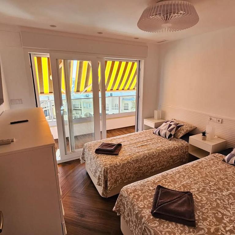 El Palmeral playa de los locos - Three-Bedroom Apartment - 23
