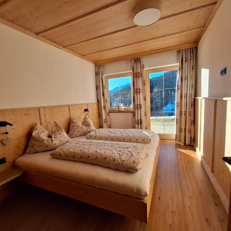Sonnenappartements Madlstatthof - Deluxe Apartment mit 2 Schlafzimmern und Gartenblick - 10