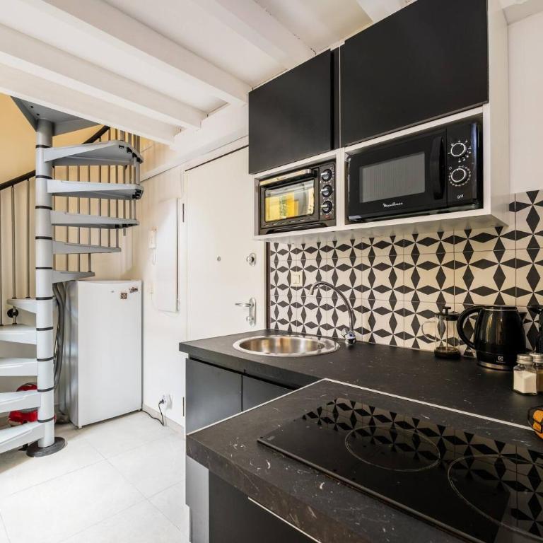 Jolie duplex avec patio - Appartement 1 Chambre avec Terrasse - 10