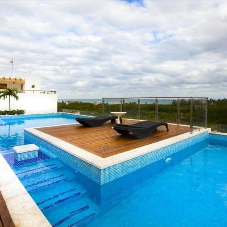Excelente ubicación a pasos de la playa Coco Beach y de la Quinta Avenida - Apartamento de 2 dormitorios - 1