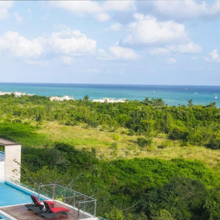 Excelente ubicación a pasos de la playa Coco Beach y de la Quinta Avenida - Apartamento de 2 dormitorios - 6