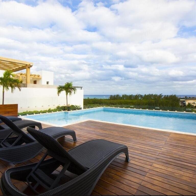 Excelente ubicación a pasos de la playa Coco Beach y de la Quinta Avenida - Apartamento de 2 dormitorios - 30