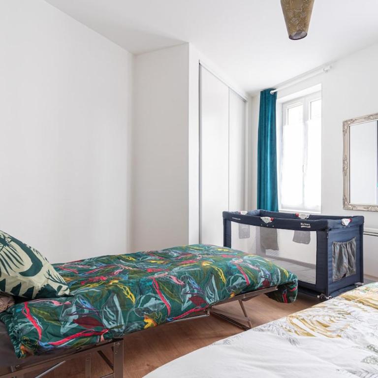 Tous à la Plage Lit King Size - One-Bedroom Apartment - 11