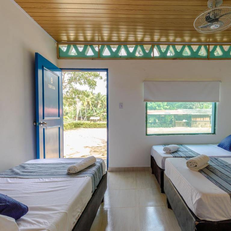 CASA DE CAMPO CASTILLETE dentro del PARQUE TAYRONA - Habitación Familiar Estándar - 5