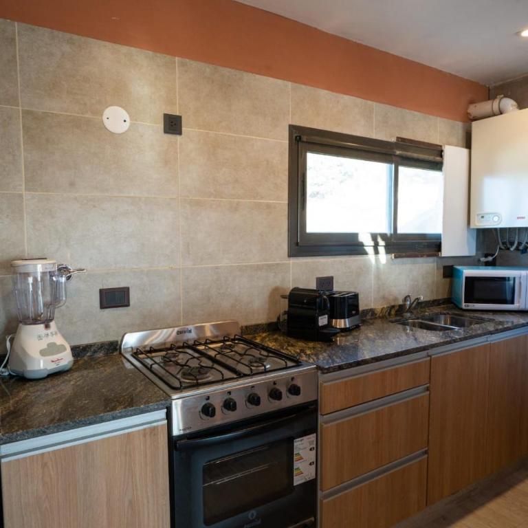 Alojamiento 8 cabañas - Apartamento de 2 dormitorios - 4