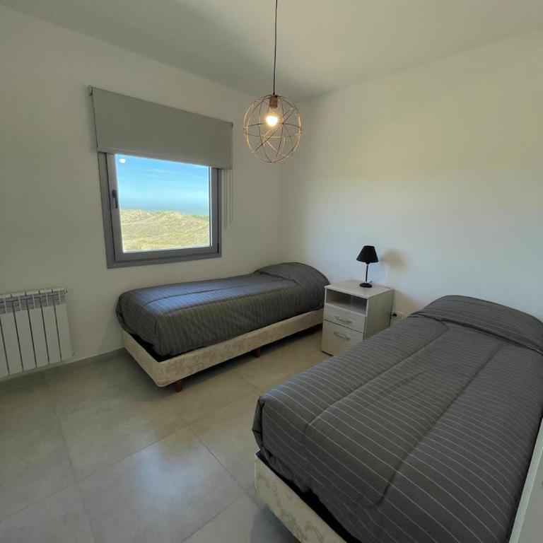 Departamento de lujo frente al mar con vista panorámica, pileta y cochera privada - Apartamento de 2 dormitorios - 12