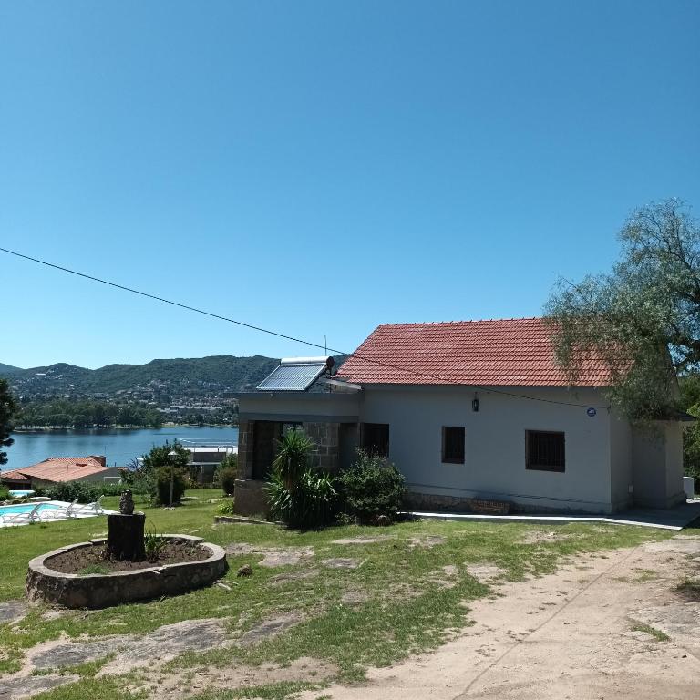Casa con vista plena al lago y a la ciudad de Villa Carlos Paz IG alquilervillacarlospaz - Casa Unifamiliar de 3 dormitorios - 7