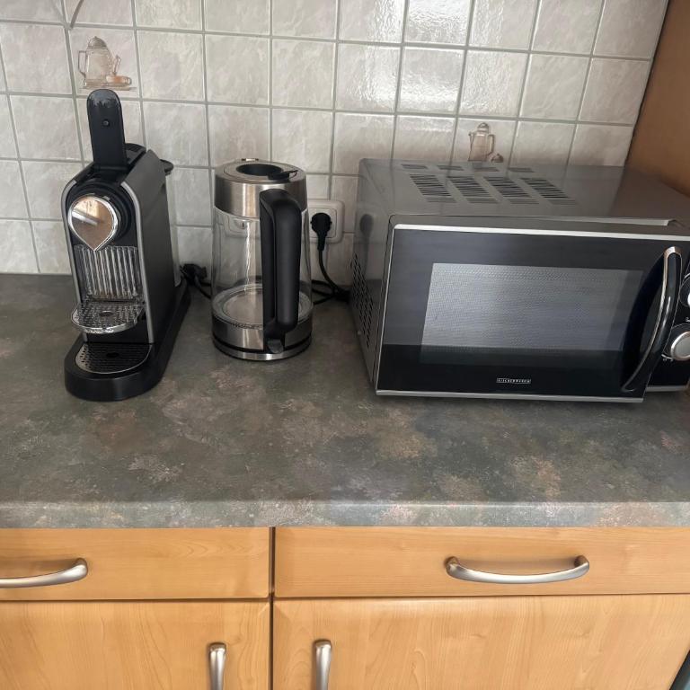 Schöne Wohnung in grüner Lage mit Fitnessgerät - Apartment mit 1 Schlafzimmer - 13