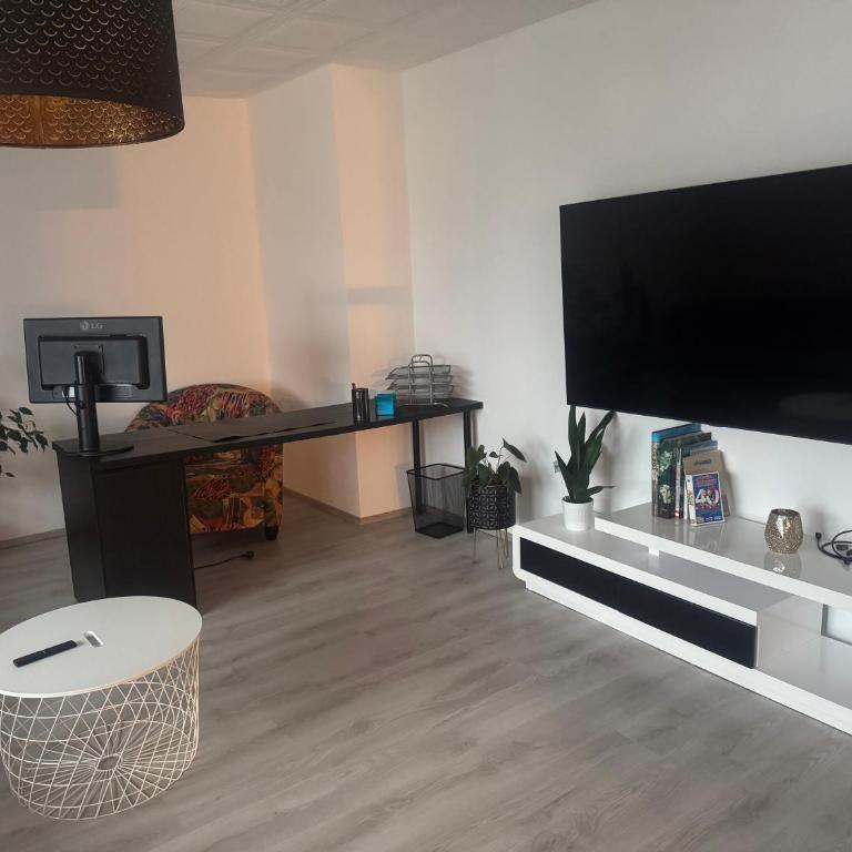 Schöne Wohnung in grüner Lage mit Fitnessgerät - Apartment mit 1 Schlafzimmer - 7