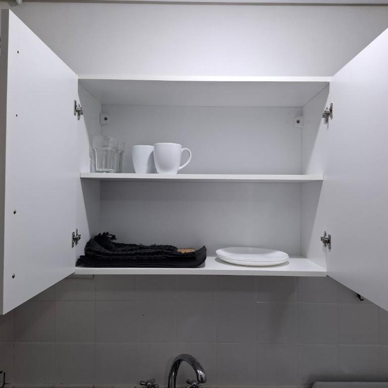 Departamento de 2 ambientes con patio y cochera privada dentro del edificio, a 2 cuadras del mar - Apartamento de 1 dormitorio - 10