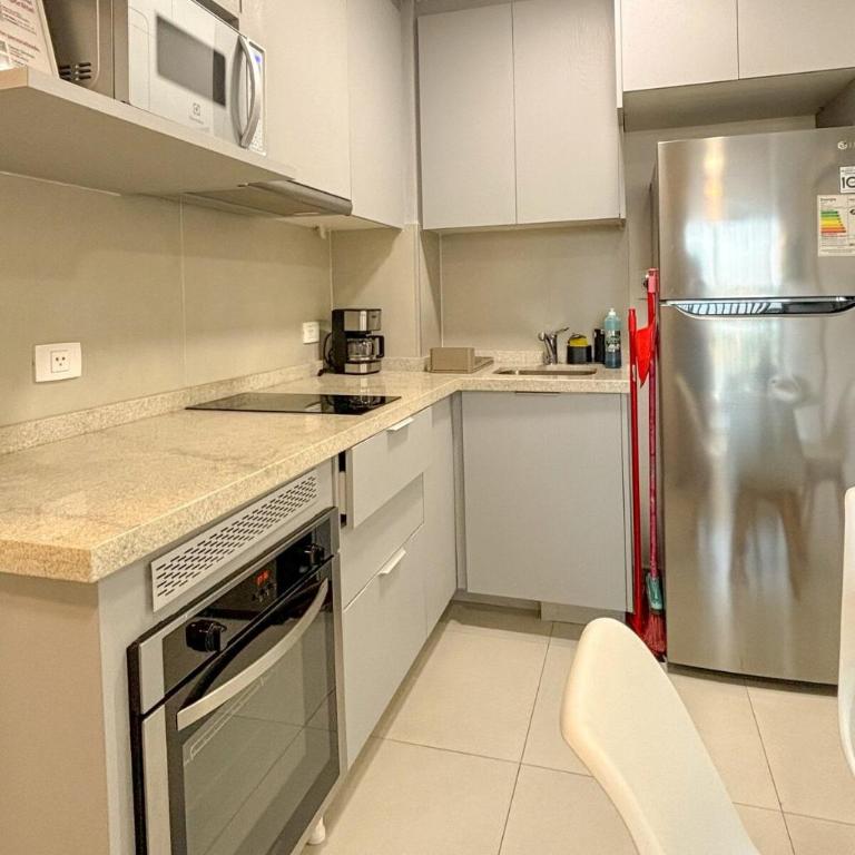 Loft with balcony and garage minutes away from corporate axis - One-Bedroom Apartment - 2