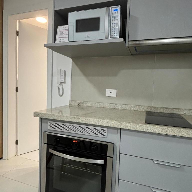 Loft with balcony and garage minutes away from corporate axis - One-Bedroom Apartment - 16