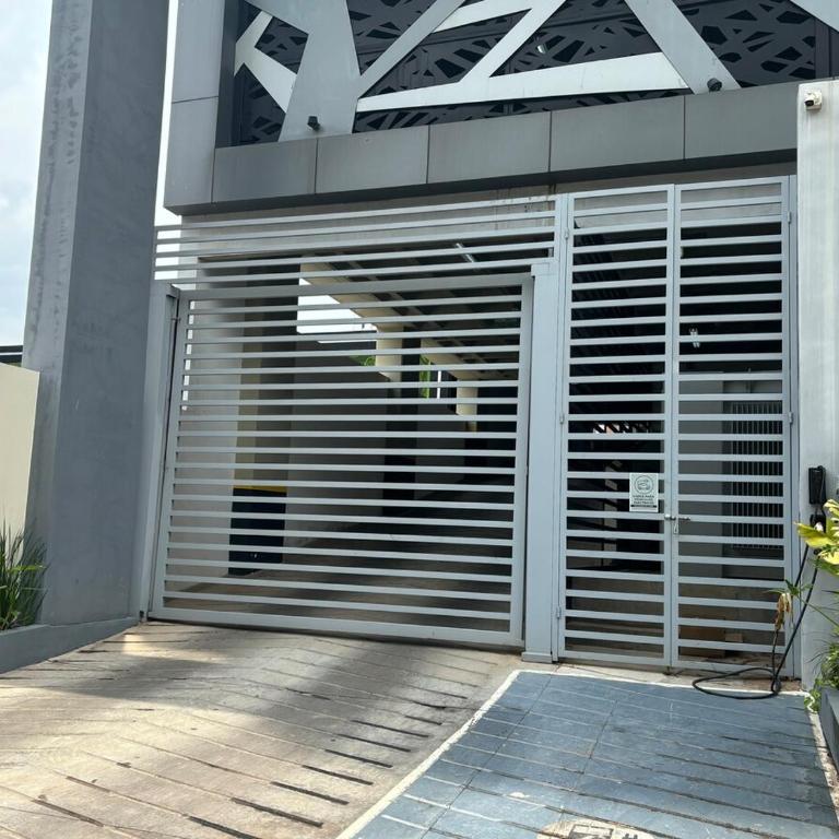 Loft with balcony and garage minutes away from corporate axis - One-Bedroom Apartment - 17