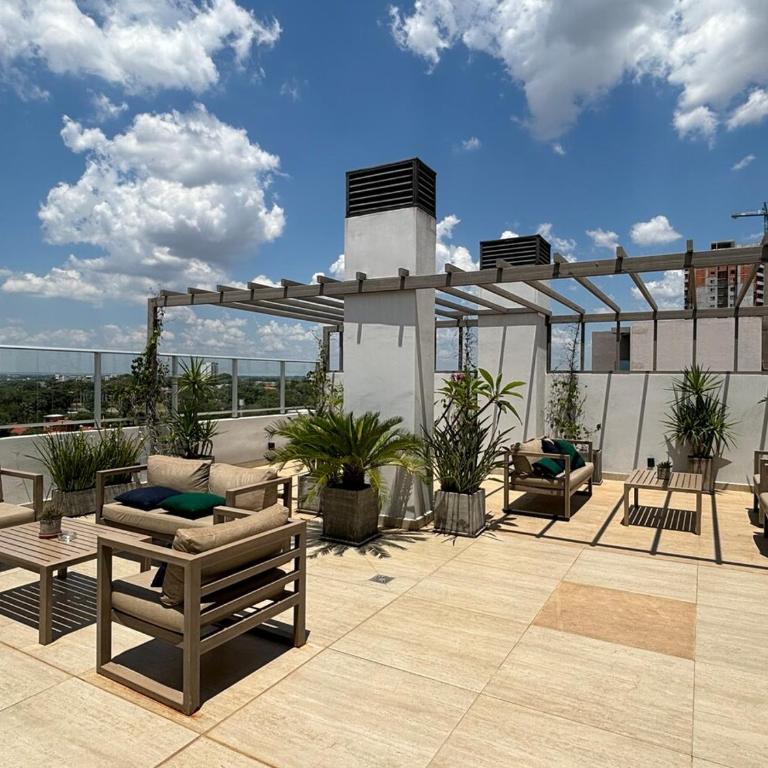 Loft with balcony and garage minutes away from corporate axis - One-Bedroom Apartment - 59