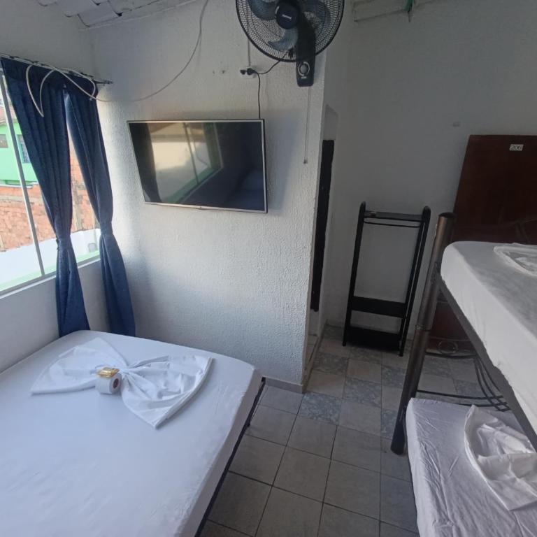 Hotel Mariu Melgar - Habitación Cuádruple con baño privado - 1
