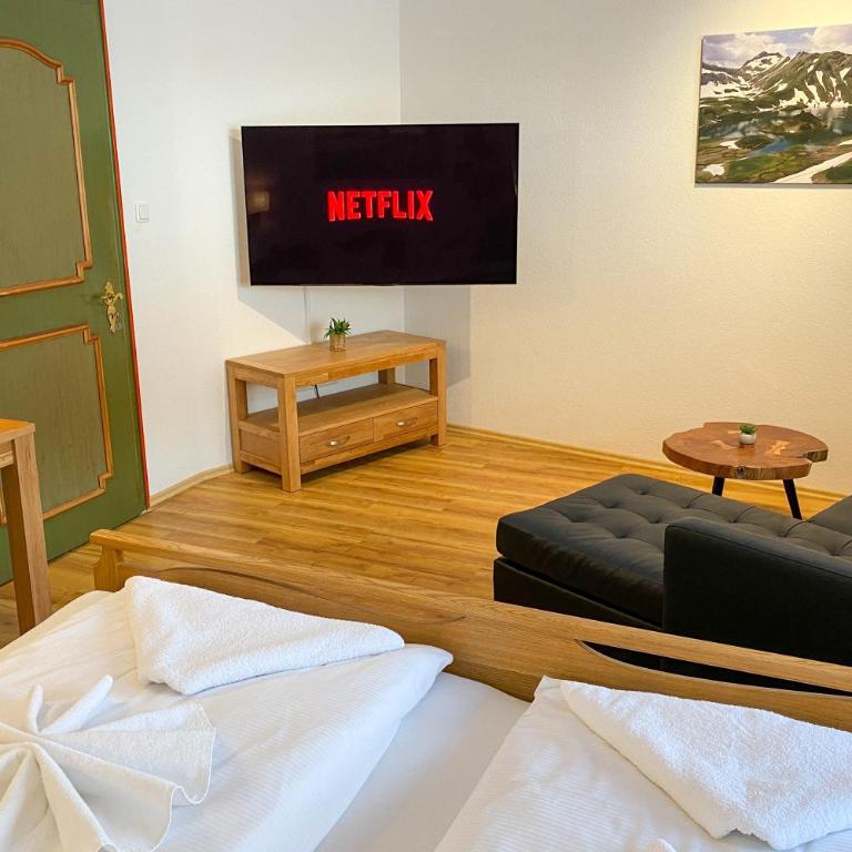 Haus Breitenberg im Allgäu - inklusive Bergbahnen und Skipass - Deluxe Apartment mit 2 Schlafzimmern und Gartenblick - 9