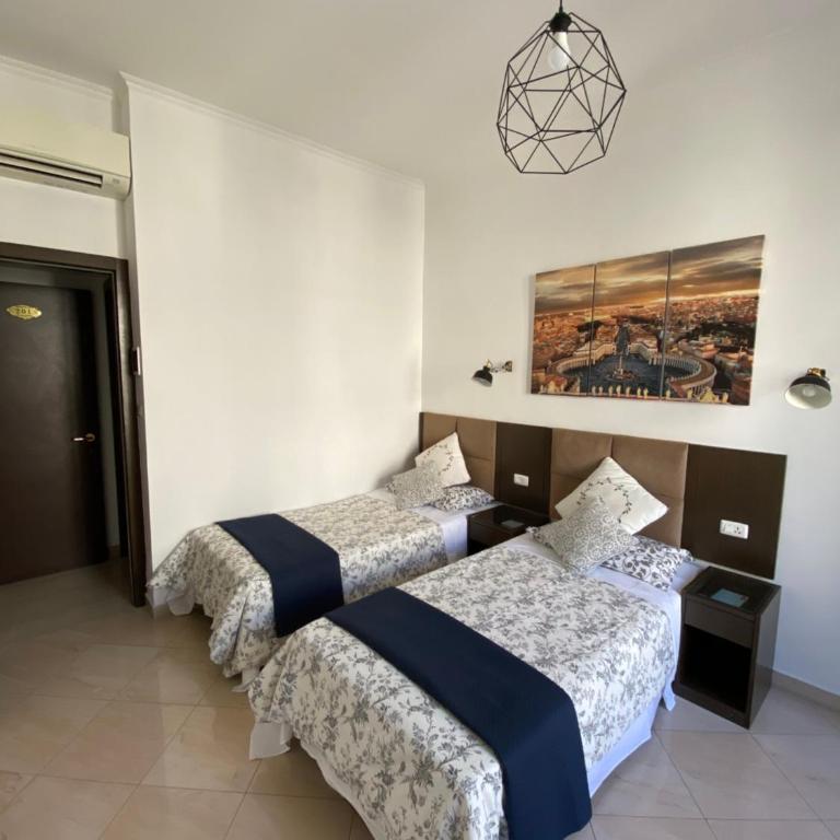 Roomz Romestay - Camera Standard Doppia con Letti Singoli - 4
