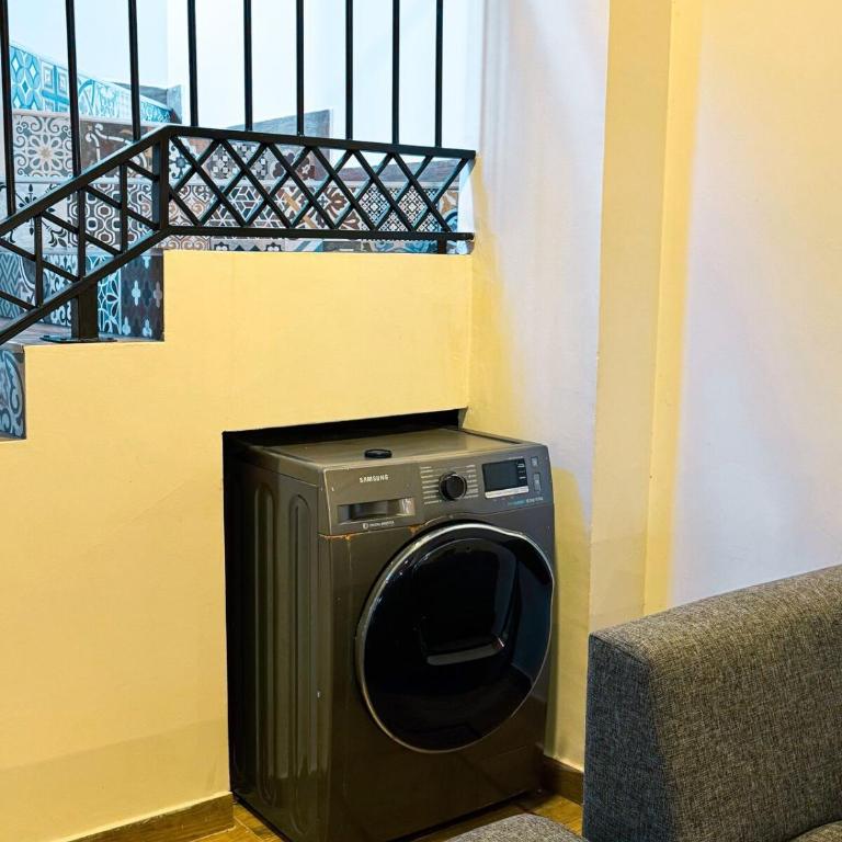 Casa estilo americano cerca del Shopping Mariscal con 2 garajes y WiFi - Two-Bedroom Townhouse - 29