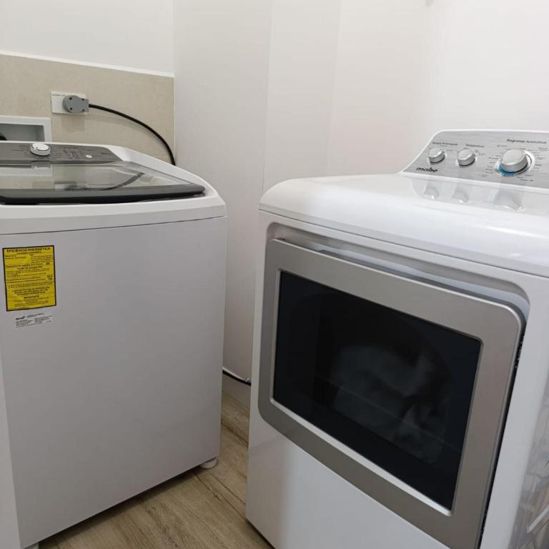 Suite Estadio Olímpico Atahualpa - Apartamento de 1 dormitorio - 54