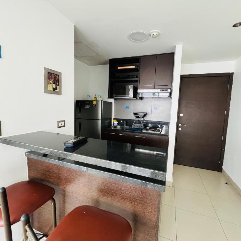Moderna Suite - Parqueo - Piscina - CitySuites 1204 - Apartamento de 1 dormitorio - 2