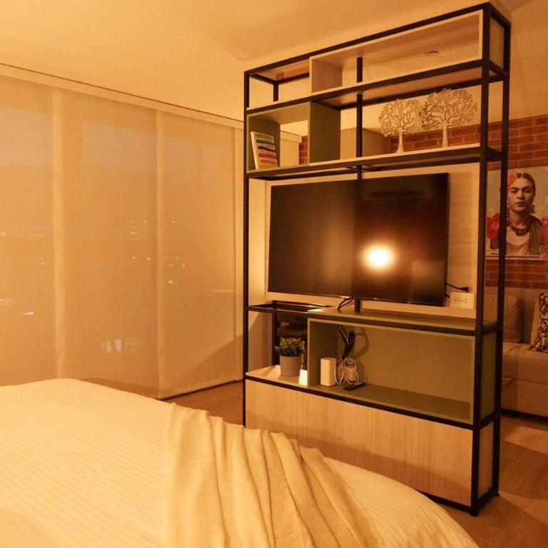 NEW in laurels with air , loft type, giant tv - Apartamento de 1 dormitorio - 7