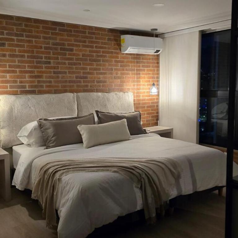 NEW in laurels with air , loft type, giant tv - Apartamento de 1 dormitorio - 9