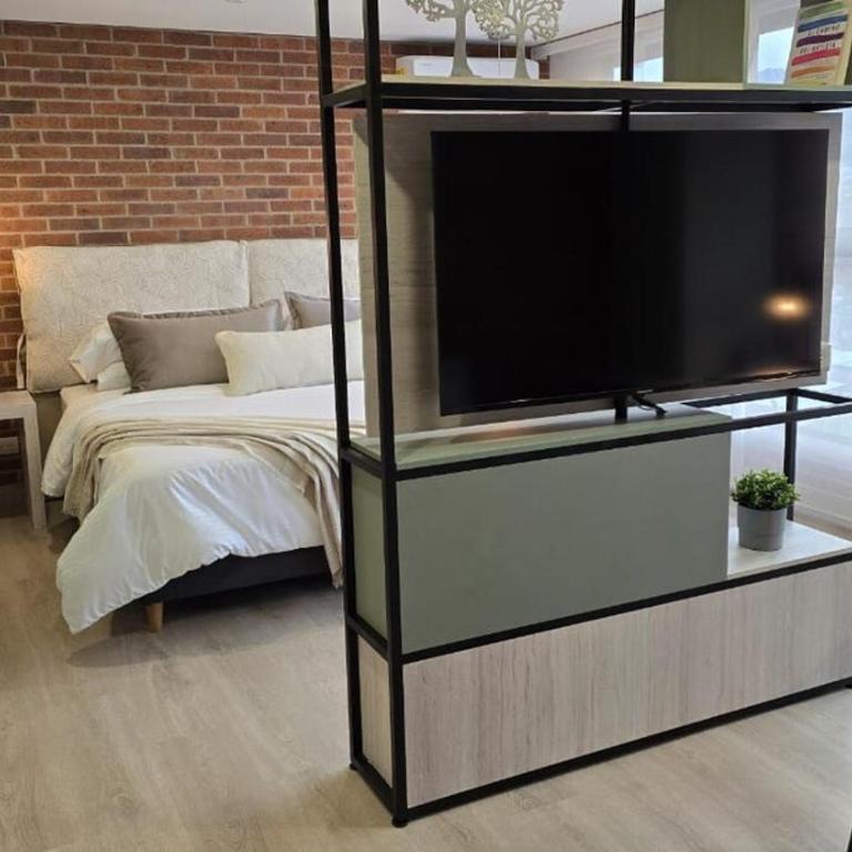NEW in laurels with air , loft type, giant tv - Apartamento de 1 dormitorio - 39