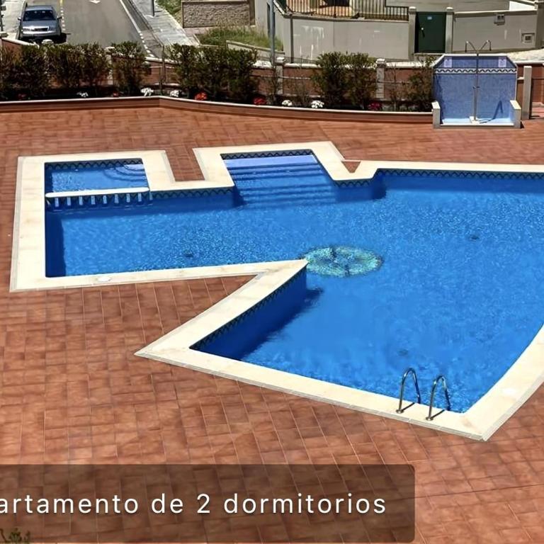 Apto en Urbanizacion Isla de Ons con garaje, piscina y vistas al mar - Apartamento de 2 dormitorios - 4