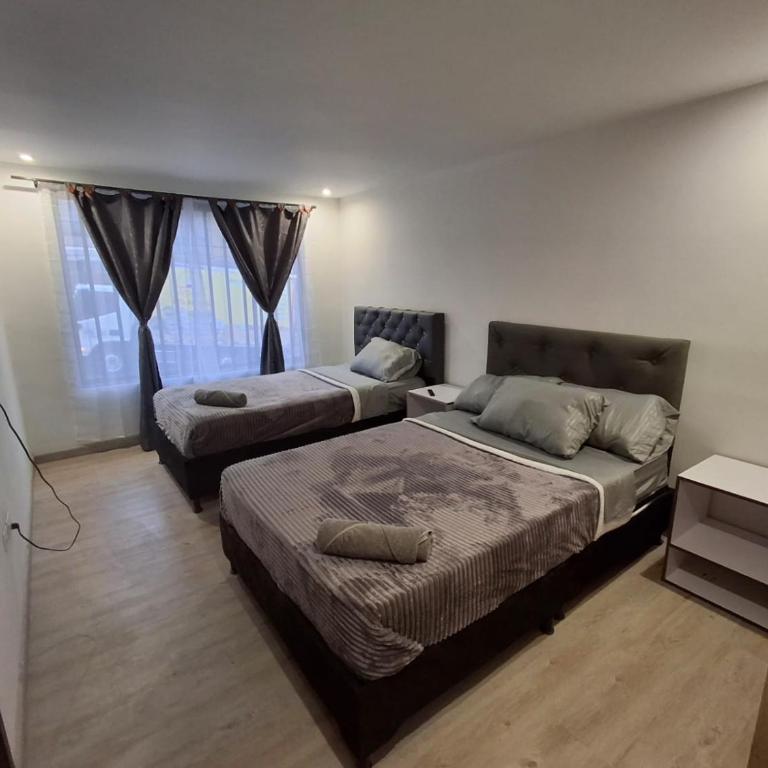 Hermosa casa con espacios independientes cerca a Mall plaza - Apartamento Estándar de 2 dormitorios - 13