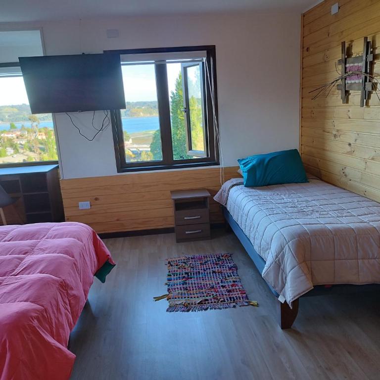 Cabañas y hostal Aurora - Habitación Familiar con vistas al mar - 10