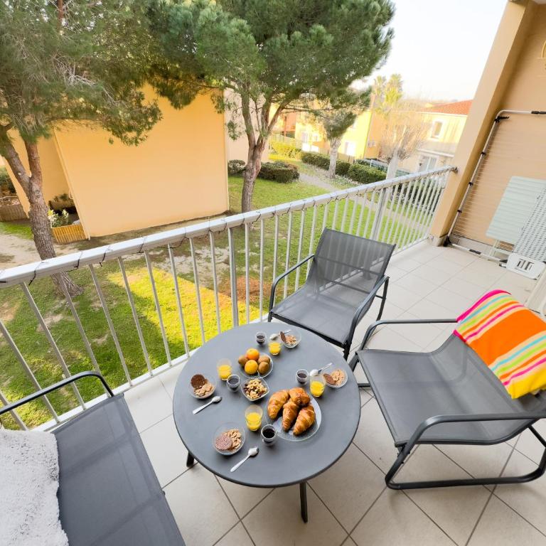 L'échappée verte - T2 - Confort -Piscine - Tennis- Parking - Climatisation - SudSéjourConciergerie - One-Bedroom Apartment with Balcony - 13