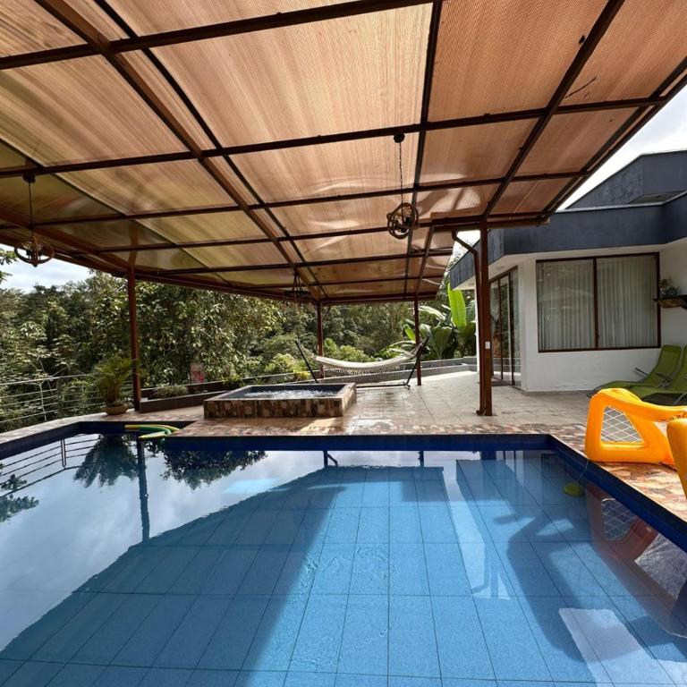 Casa vacacional en Pedro Vicente Maldonado - Four-Bedroom House - 3