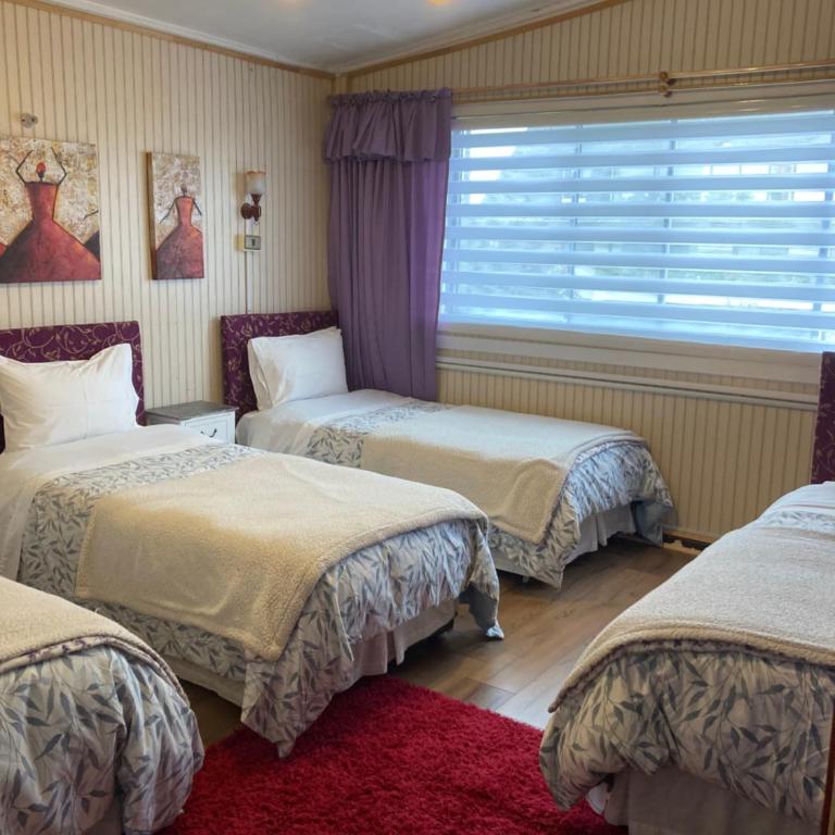 Hostal Argentina Osorno - Habitación Cuádruple Clásica - 1