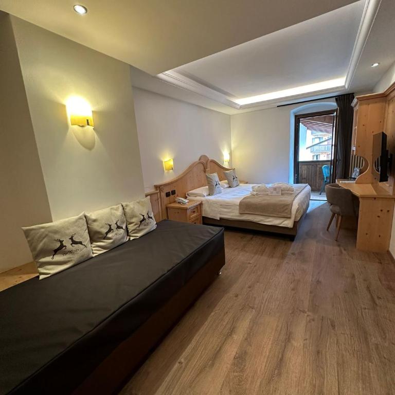 Hotel Isolabella Wellness - Habitación Triple Confort - 2