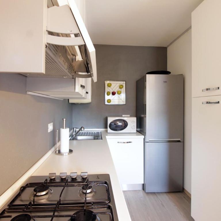 CASA 4 PIOPPI - Agenzia Dolomiti Affitti - Appartamento con 2 Camere da Letto - 56