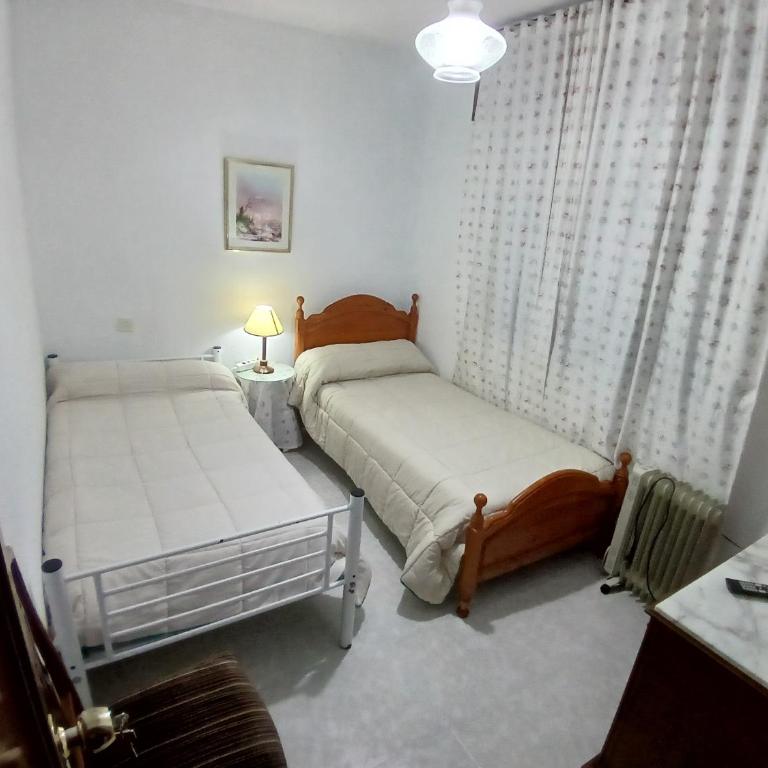 Habitación Privada Doble Toledo - Habitación Estándar con baño compartido - 2 camas - 3