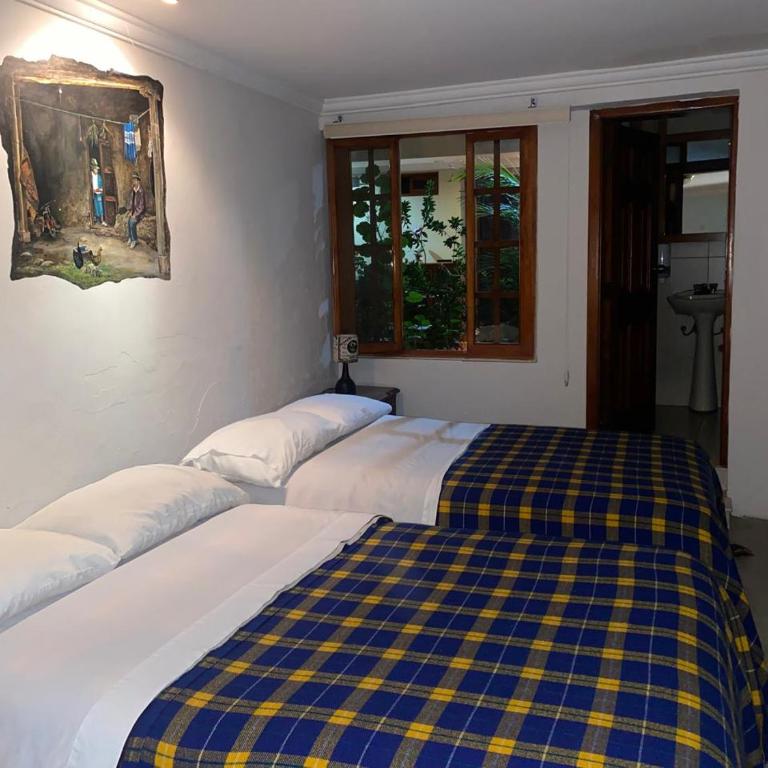 Posada Todos Santos - Cama individual en dormitorio mixto - 1