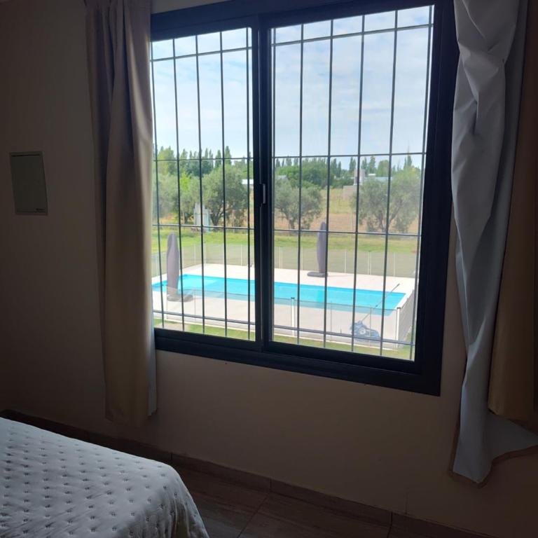 5 min Restaurantes Bares, Piscina, Parrilla, Cochera - Apartamento de 2 dormitorios - 15