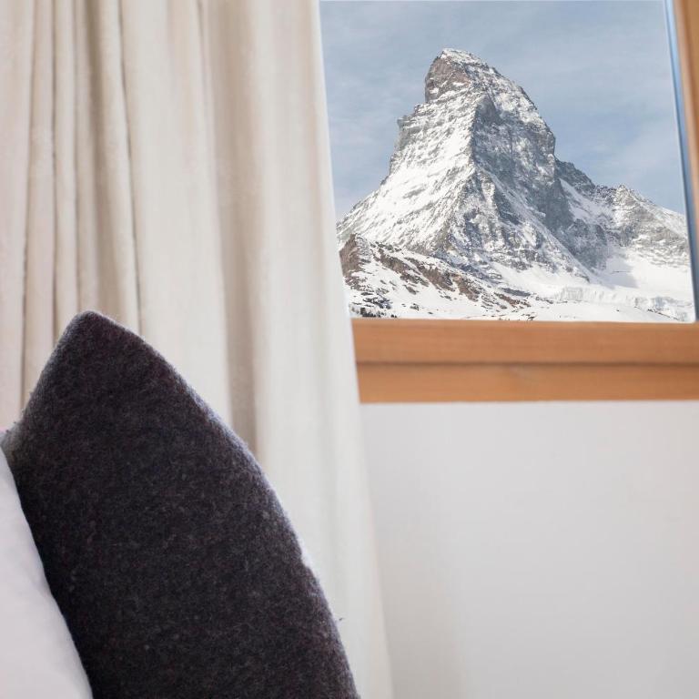 Sonnmatten Boutique Hotel & Apartments Zermatt - Apartment mit 3 Schlafzimmern - 1. Etage mit Balkon und Blick auf das Matterhorn - 17