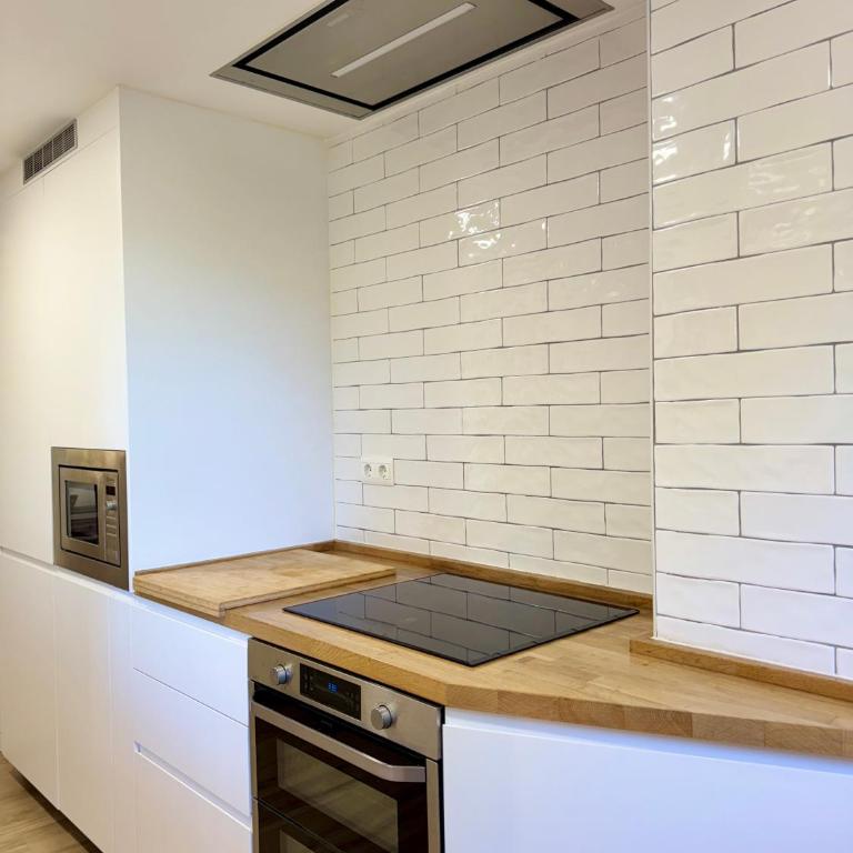 The Cozy House by Kura Homes - Three-Bedroom Apartment - 16