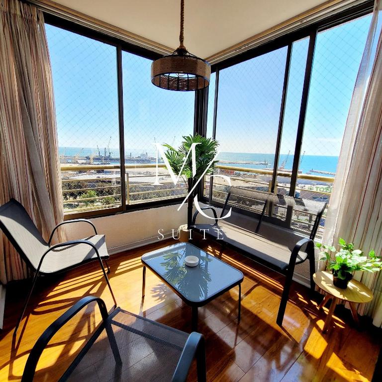 Comodidad total en el centro: Deptos 1, 2 y 3 hab. + WiFi y Parking incluidos - Habitación Triple Superior con vistas al mar - 10