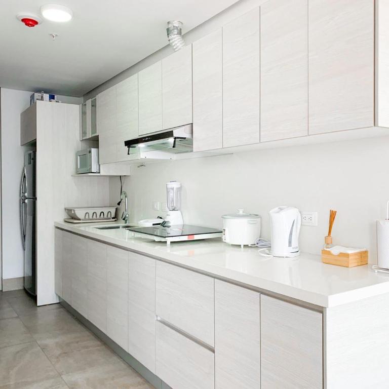 Suites cerca del aeropuerto - terminal terrestre y centros comerciales - Suite with City View - 26